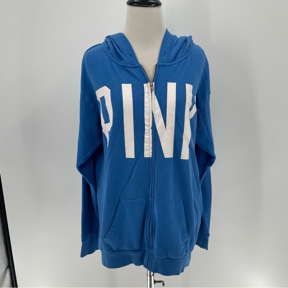 Pink Woman’s Blue Jacket